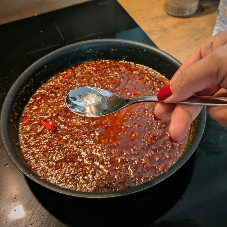 Garlic, shallots, ginger, fresh chilies sizzling in vegetable oil, making Nepali-style saucy chili oil, chili oil recipe, my chilli oil recipe, chili sauce, food recipes, chili garlic sauce, Saru's not sos secret diary, saru's diary , Homemade Saucy Chili Oil Recipe (Better Than Store-Bought!)