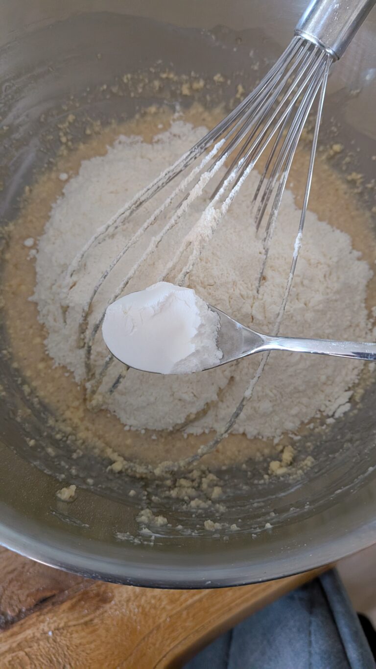 Blueberry Muffins Recipe – Method 2: Made with Butter, Freshly baked blueberry muffins made with butter, golden tops, juicy blueberries bursting inside, tender and fluffy crumb, muffins cooling on a wire rack, home-baked breakfast treat, natural light, food blog, muffin ideas, muffin recipes, blueberries recipes, baking with blueberries, baking recipes, easy muffin recipes, saru's diary, saru's not so secret diary