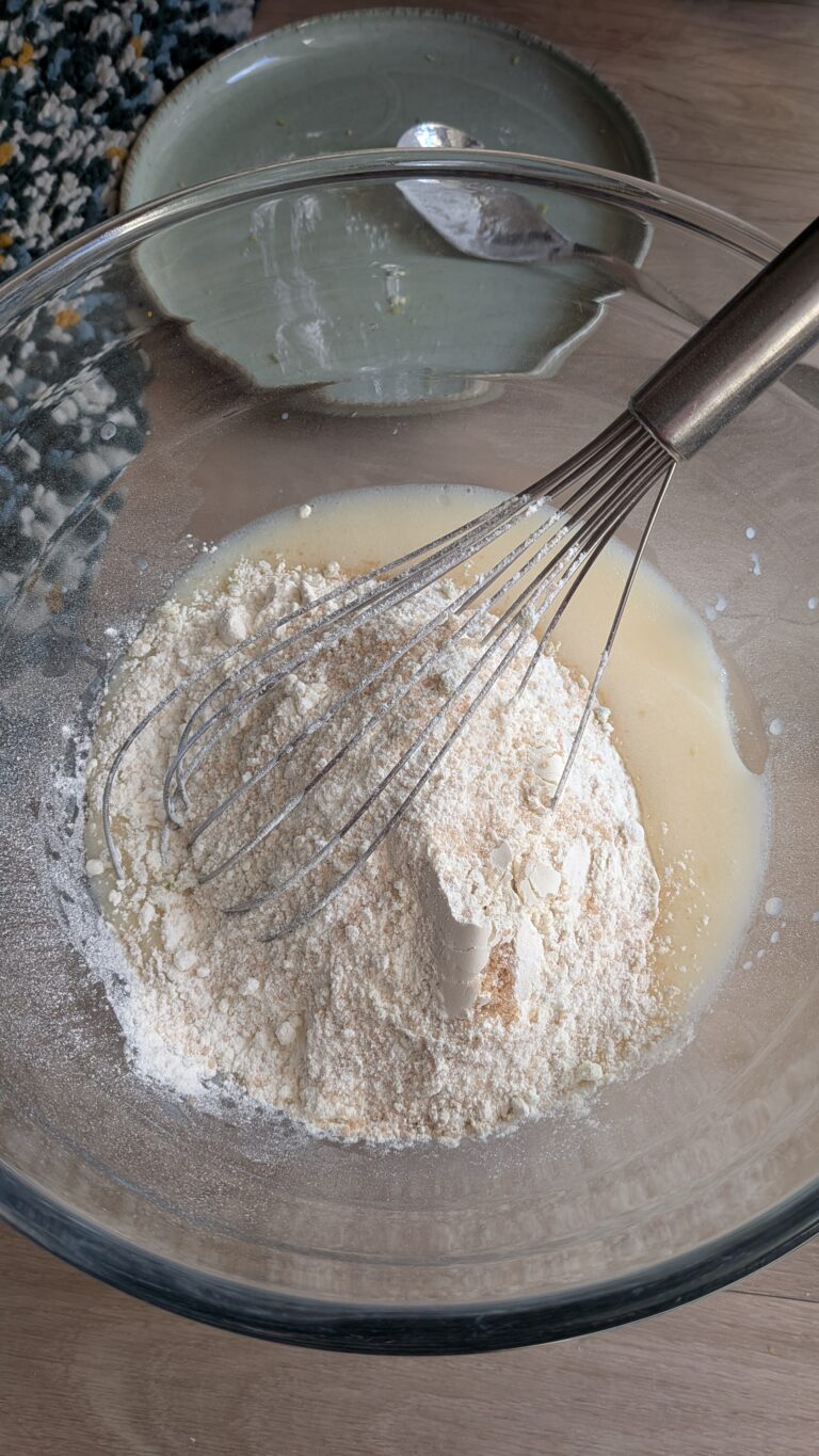 Blueberry Muffins Recipe – Method 1: Made with Oil, Freshly baked blueberry muffins made with oil, golden tops, vibrant bursts of blueberries, soft fluffy texture, muffins cooling on a rack, natural light, home-baked breakfast treat, saru's diary, saru's not so secret diary, easy muffin recipes, muffins, blueberries recipe, food recipes, dessert recipes, baking recipes