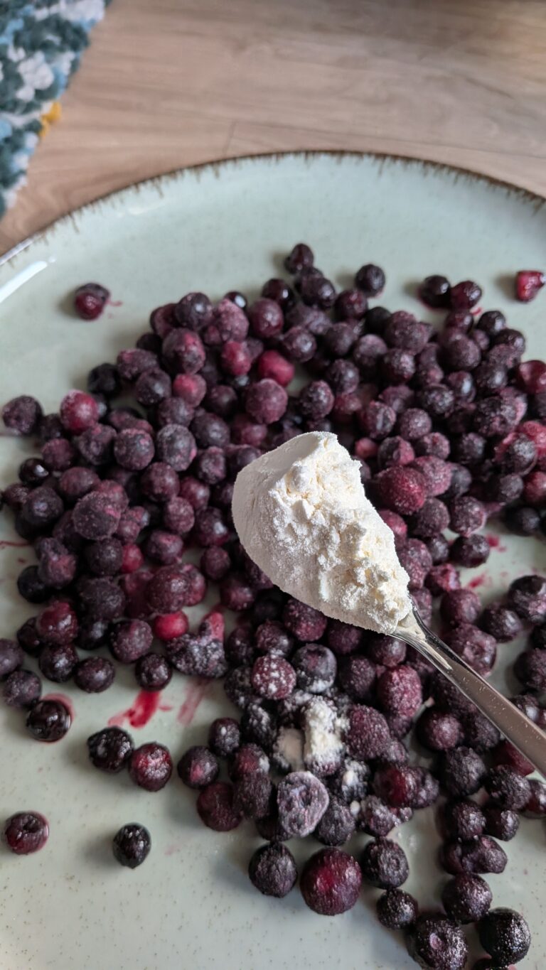 Blueberry Muffins Recipe – Method 1: Made with Oil, Freshly baked blueberry muffins made with oil, golden tops, vibrant bursts of blueberries, soft fluffy texture, muffins cooling on a rack, natural light, home-baked breakfast treat, saru's diary, saru's not so secret diary, easy muffin recipes, muffins, blueberries recipe, food recipes, dessert recipes, baking recipes