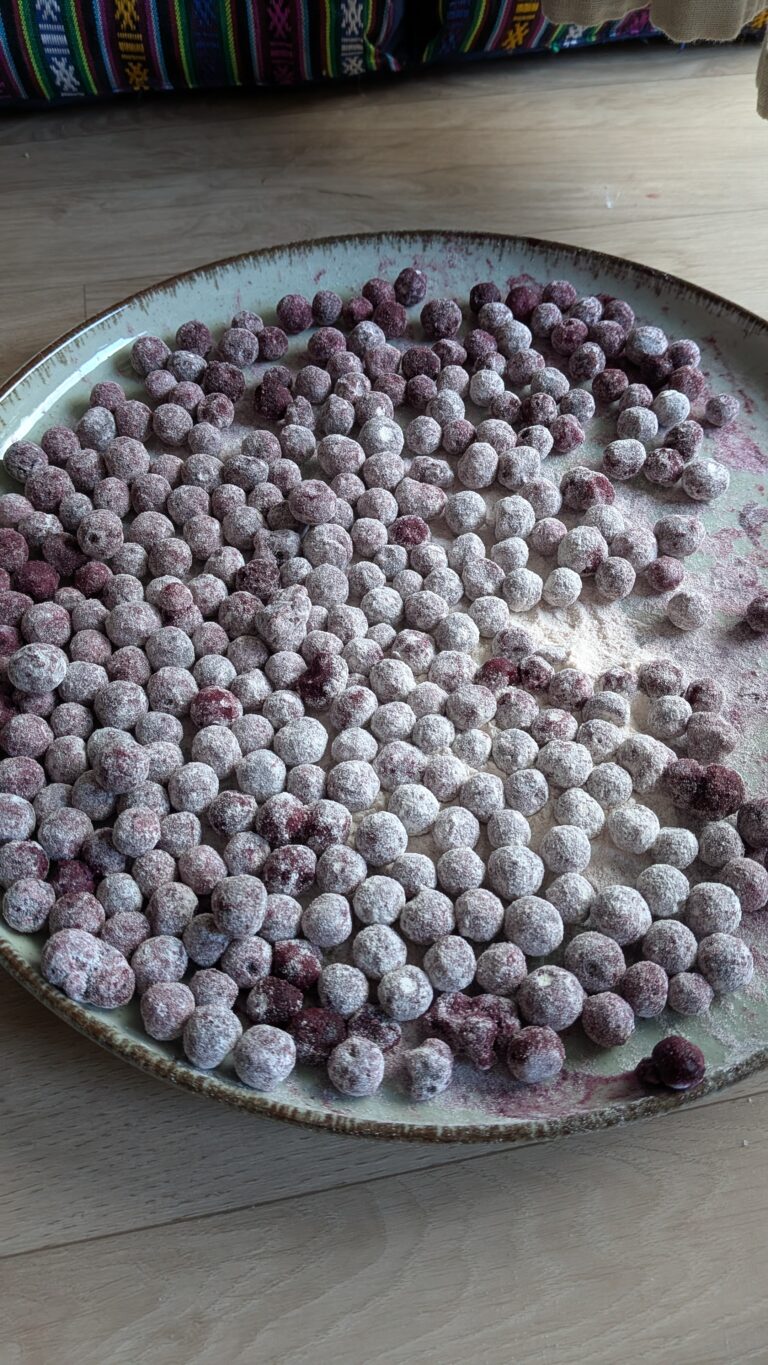 Blueberry Muffins Recipe – Method 1: Made with Oil, Freshly baked blueberry muffins made with oil, golden tops, vibrant bursts of blueberries, soft fluffy texture, muffins cooling on a rack, natural light, home-baked breakfast treat, saru's diary, saru's not so secret diary, easy muffin recipes, muffins, blueberries recipe, food recipes, dessert recipes, baking recipes