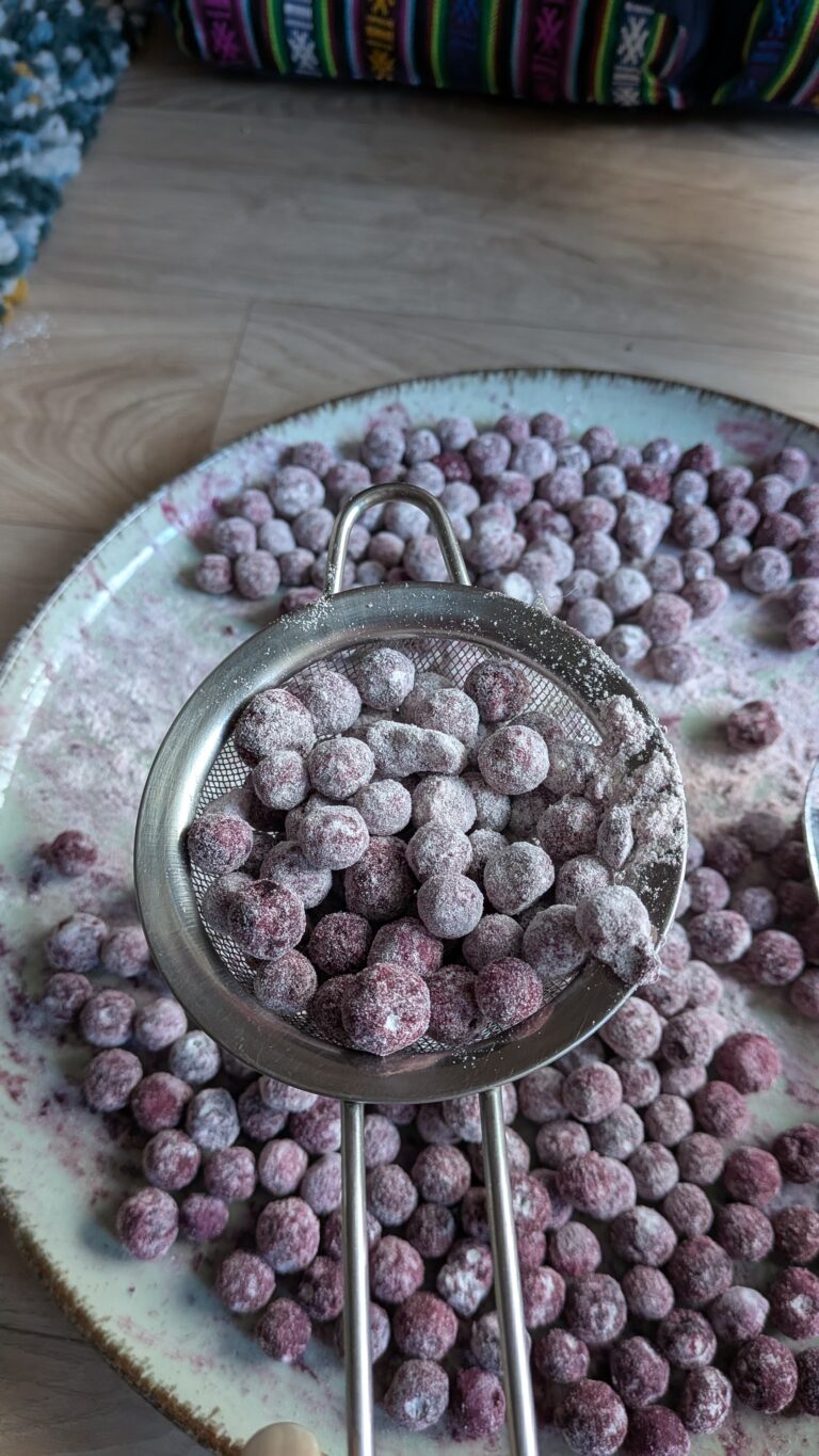 Blueberry Muffins Recipe – Method 1: Made with Oil, Freshly baked blueberry muffins made with oil, golden tops, vibrant bursts of blueberries, soft fluffy texture, muffins cooling on a rack, natural light, home-baked breakfast treat, saru's diary, saru's not so secret diary, easy muffin recipes, muffins, blueberries recipe, food recipes, dessert recipes, baking recipes