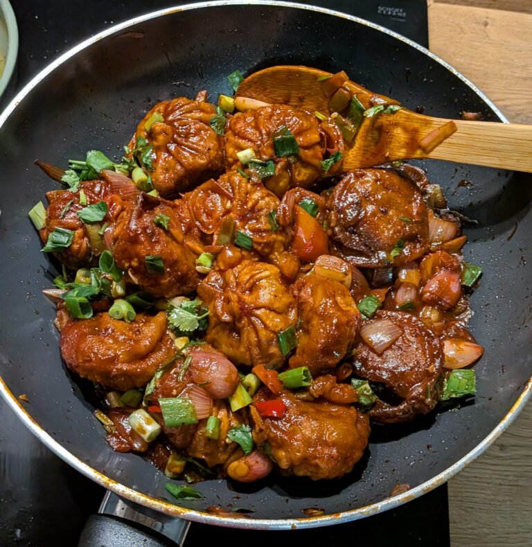Nepali Chilli Fried Momo (Kathmandu-Style C Momo), Kathmandu-style chilli fried momo served hot with golden fried momo tossed in spicy tomato soy sauce, bell peppers, onions, fresh chillies, and garnished with cilantro and scallions, saru's diary, saru's not so secret diary, nepali food ideas, nepali food recipes, nepali, nepali food blog, food blog, authentic nepali food