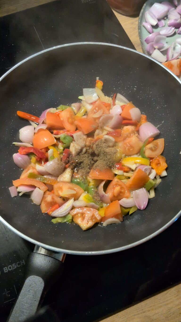 Nepali Chilli Fried Momo (Kathmandu-Style C Momo), Kathmandu-style chilli fried momo served hot with golden fried momo tossed in spicy tomato soy sauce, bell peppers, onions, fresh chillies, and garnished with cilantro and scallions, saru's diary, saru's not so secret diary, nepali food ideas, nepali food recipes, nepali, nepali food blog, food blog, authentic nepali food