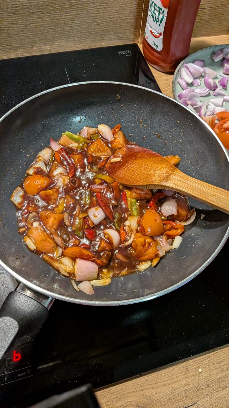 Nepali Chilli Fried Momo (Kathmandu-Style C Momo), Kathmandu-style chilli fried momo served hot with golden fried momo tossed in spicy tomato soy sauce, bell peppers, onions, fresh chillies, and garnished with cilantro and scallions, saru's diary, saru's not so secret diary, nepali food ideas, nepali food recipes, nepali, nepali food blog, food blog, authentic nepali food