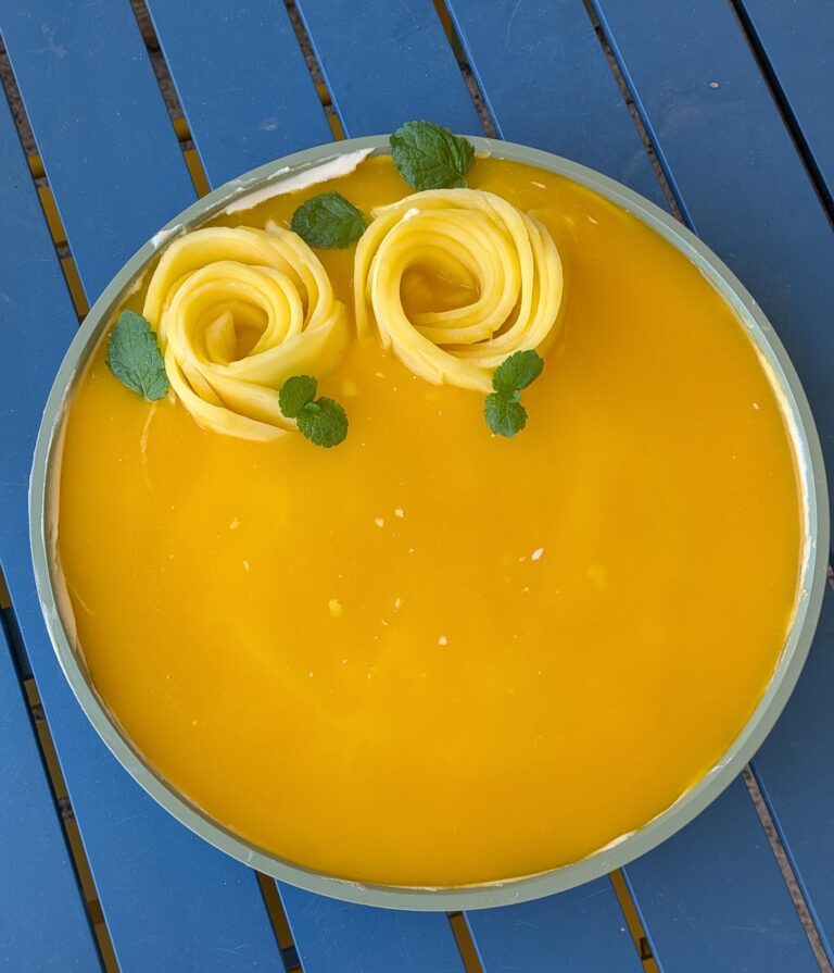 Traditional Mango Tiramisu with Canned Mango and Mascarpone, Layered traditional mango tiramisu made with canned mango, mascarpone cream, and ladyfinger biscuits in a glass dish on Saru's Diary food blog, saru's not so secret diary, Tiramisu ideas, mango recipes, mango tiramisu, summer dessert ideas, summer recipes, saru's diary